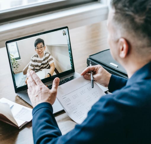 Two men in a video meeting